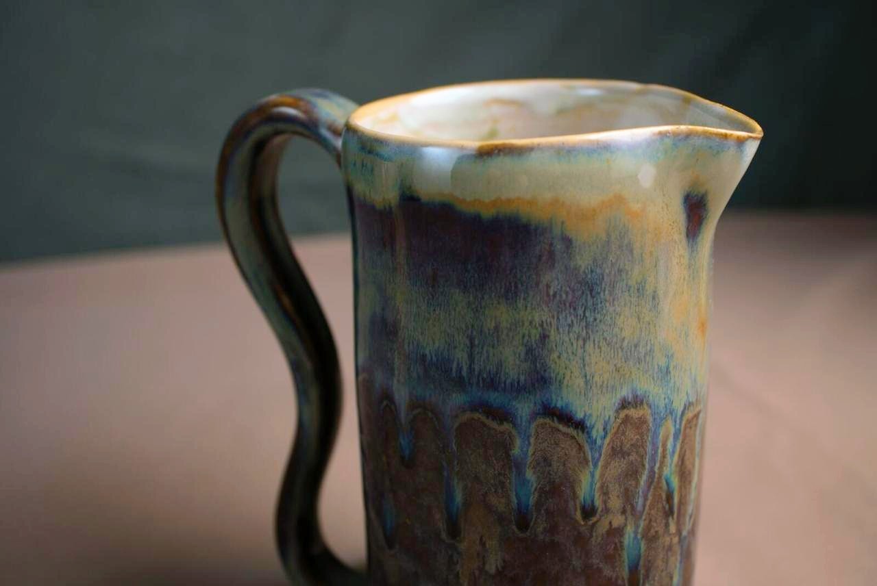 Pitcher, detail - wavy handle, glaze drips
