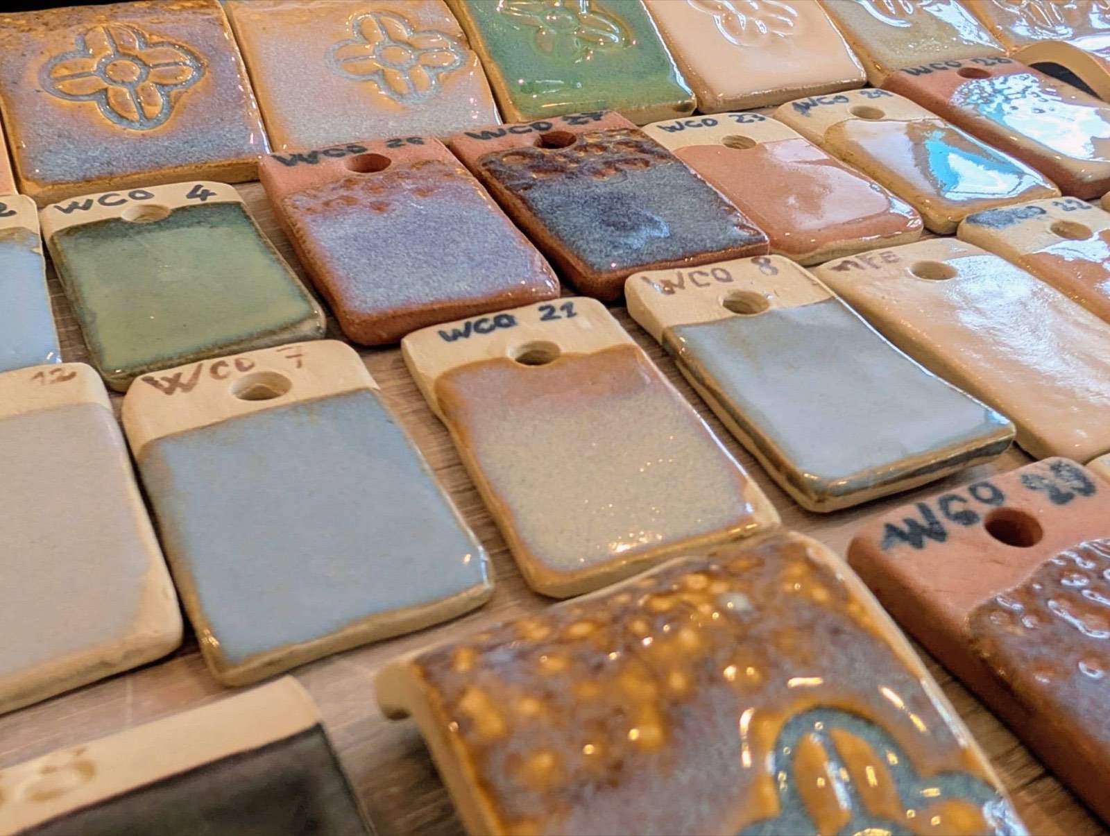 Test tiles of house-made glazes, a range of colors and textures